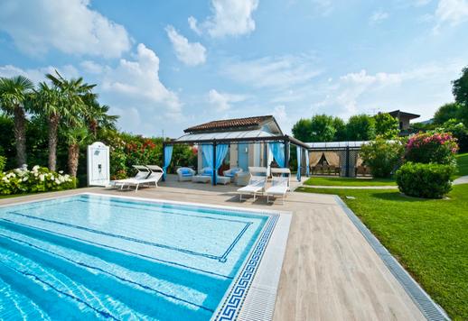 Charming estate for sale with a stunning pool and a wonderful view of the lake's calming waters Image 7