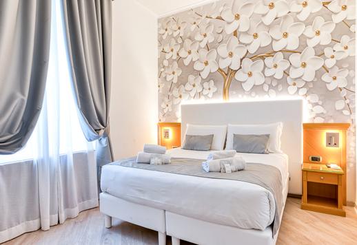 Na sprzedaż apartament przerobiony na hotel w dzielnicy Prati, naprzeciwko kultowego Zamku Image 8