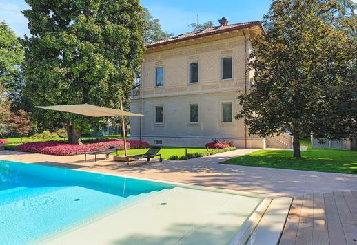 Austere and imposing in its majestic neoclassical architecture, this prestigious private estate has been redesigned as a full-featured modern villa Image 6