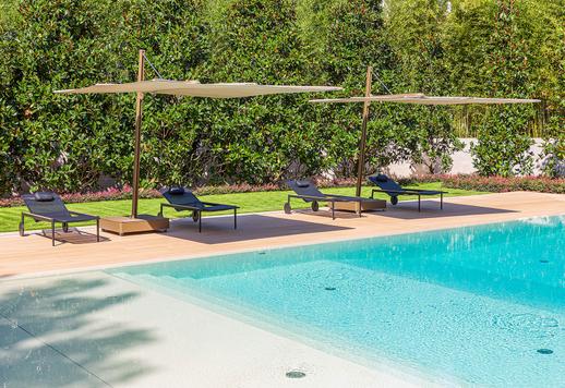 Austere and imposing in its majestic neoclassical architecture, this prestigious private estate has been redesigned as a full-featured modern villa Image 7