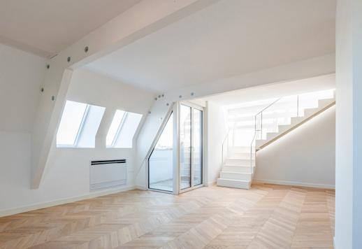 Résidence de 115 m² sur deux niveaux, avec terrasse habitable de 80 m², trois chambres, trois salles de bains, finitions design et garage dans un quartier résidentiel desservi par les lignes de métro. Image 3